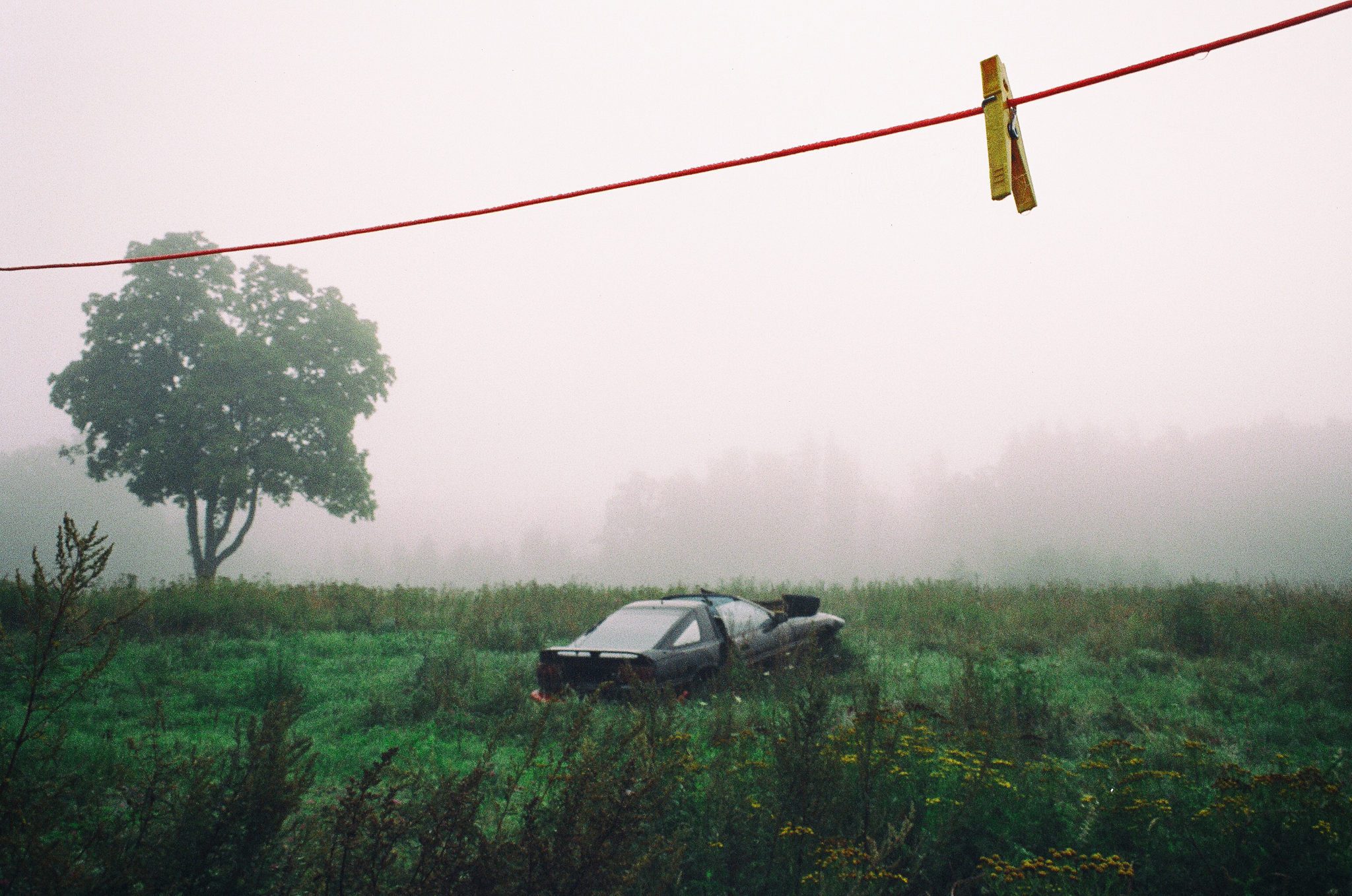 Old Car in Field Heard On Air Blog